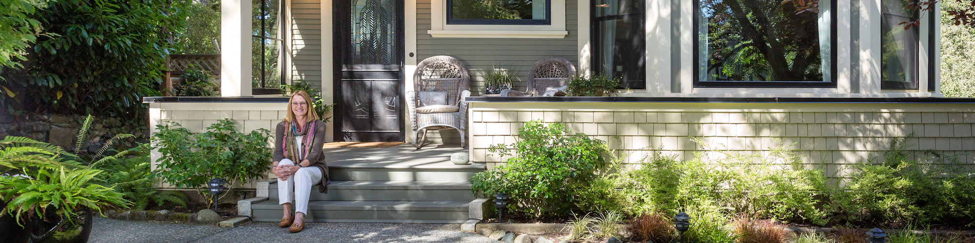 wendy moreton on the porch of a Victoria BC traditional house